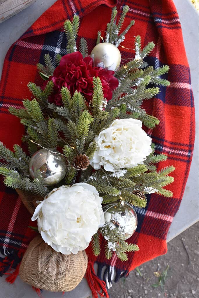 Mini evergreen tree with peonies.