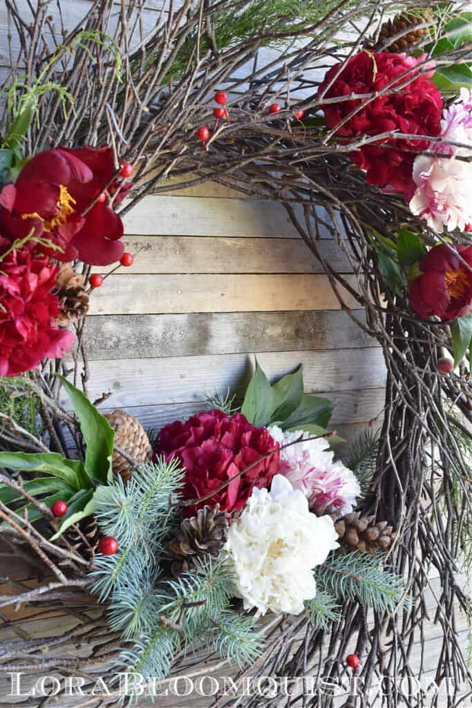 Christmas wreath with fresh peonies.