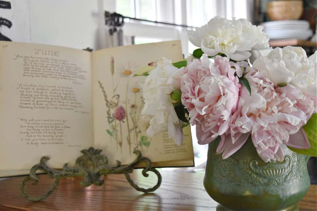 Peonies in green pitcher.