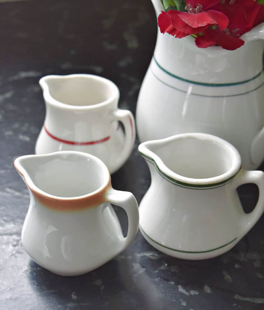 Vintage hotelwear creamers.