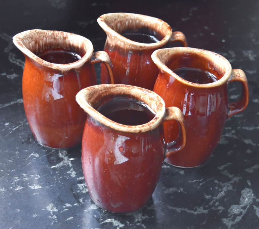 Brown drip mini pitchers.
