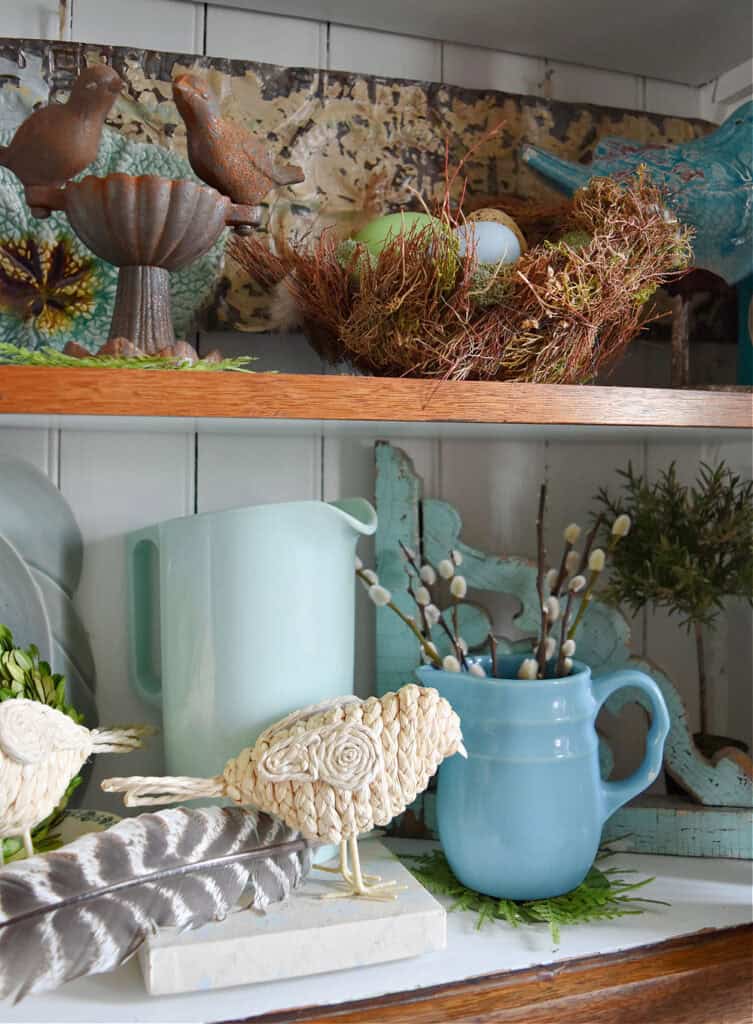 Aqua pitchers in Spring bird display.