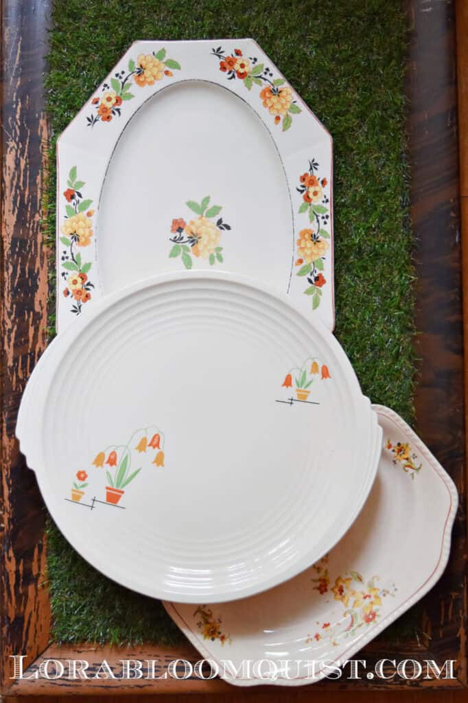 Vintage platters with fall colored flowers.