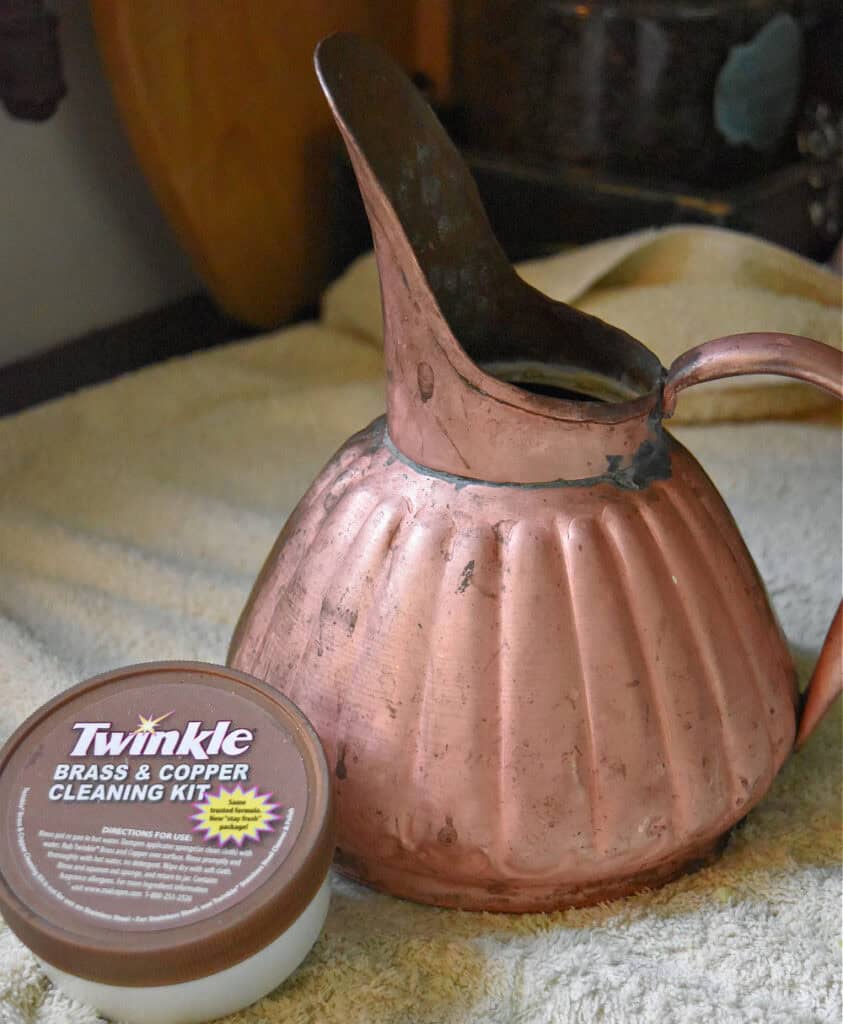 Copper watering can.
