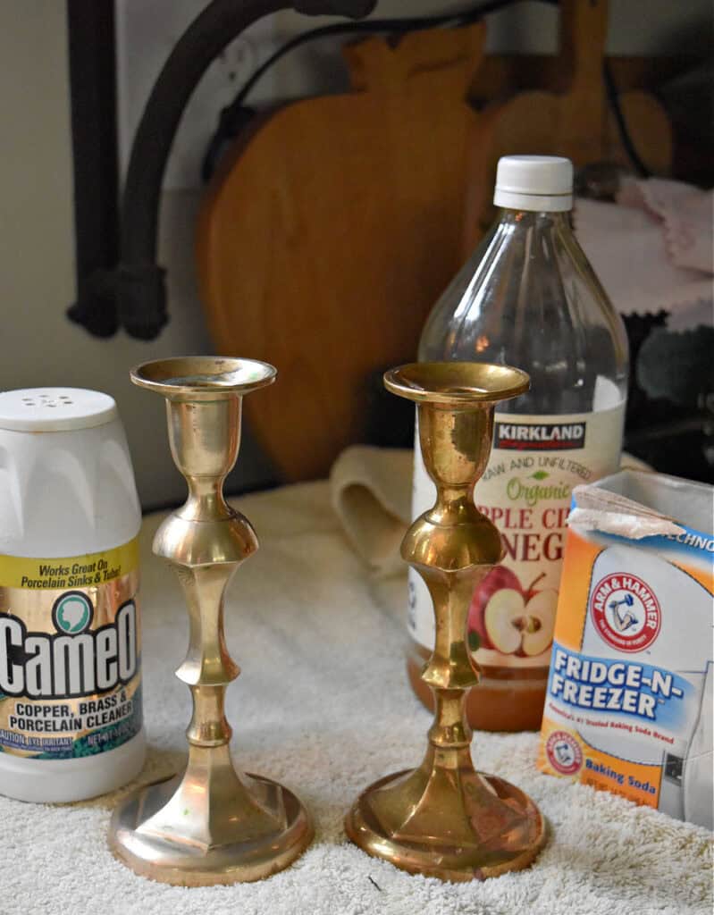 Brass candlesticks getting cleaned.