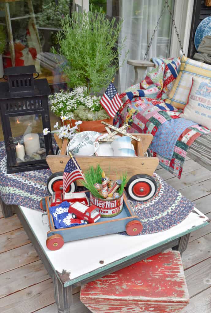Patriotic porch decor with thrifted vintage finds.