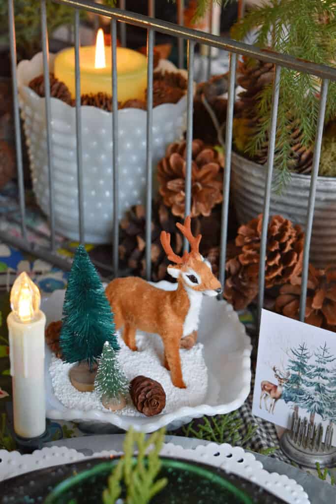 Mini deer figurine as table setting decor.