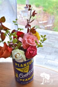 roses in vintage Planter's can