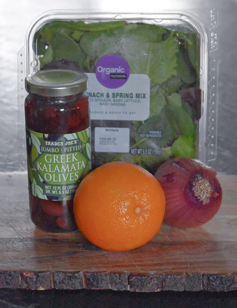 Fresh salad ingredients: lettuce and more.