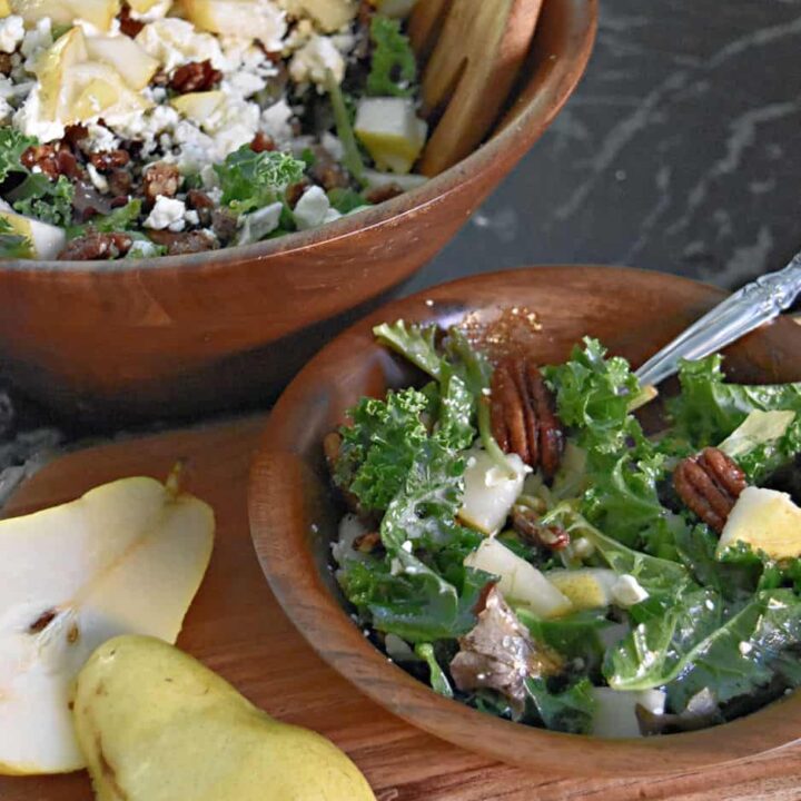 Pear Gorgonzola salad in wooden bowls.