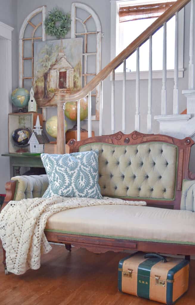 Antique button tufted settee.