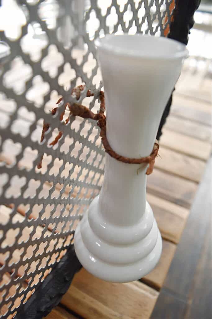 Milkglass vase hanging on upcycled frame