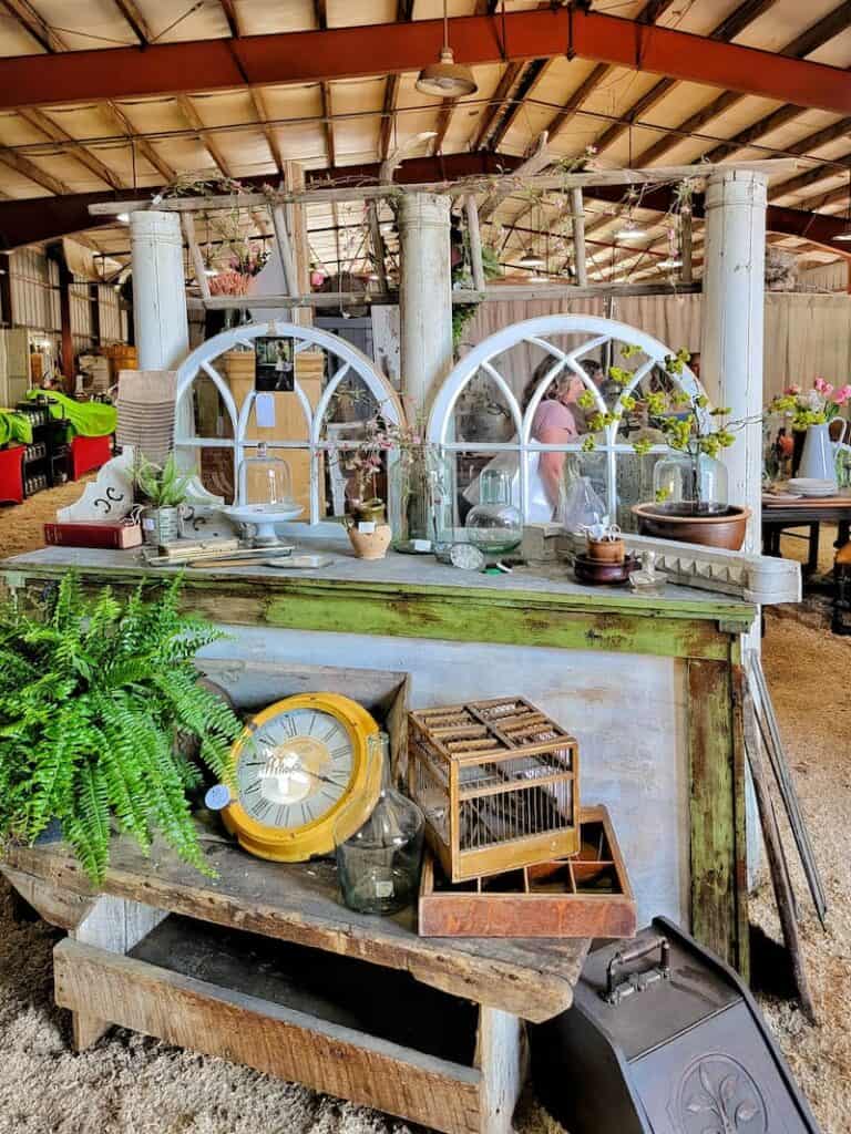 Vintage market booth display with old windows