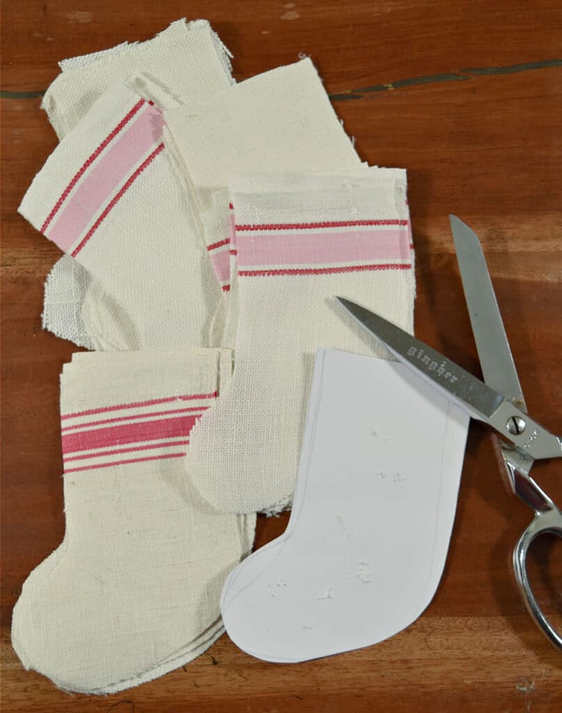 Striped scrap fabrics for DIY mini Christmas stockings.