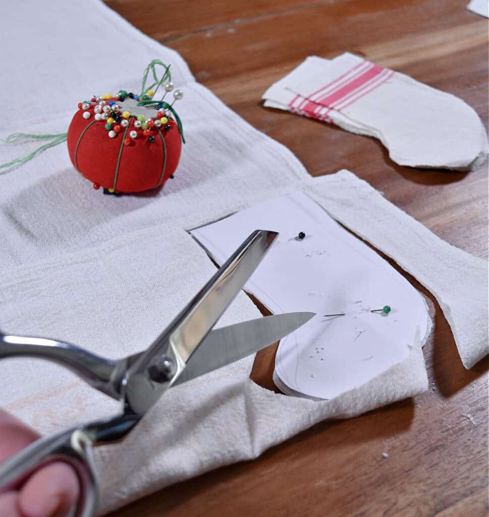 Crafting mini scrap fabric Christmas stocking.