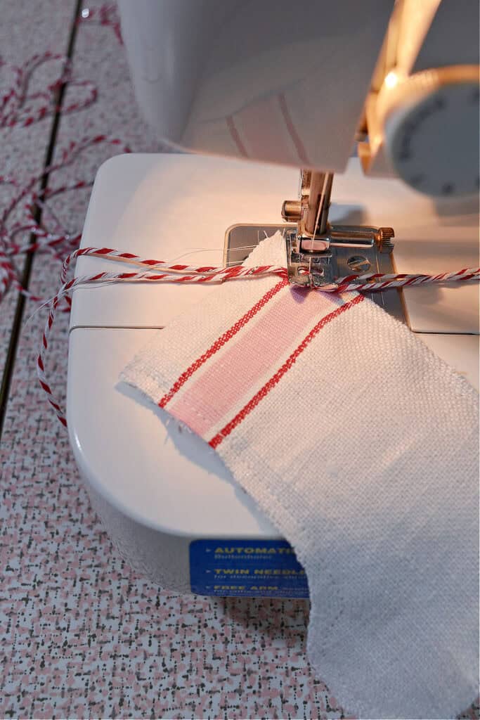 Crafting mini scrap fabric Christmas stocking.