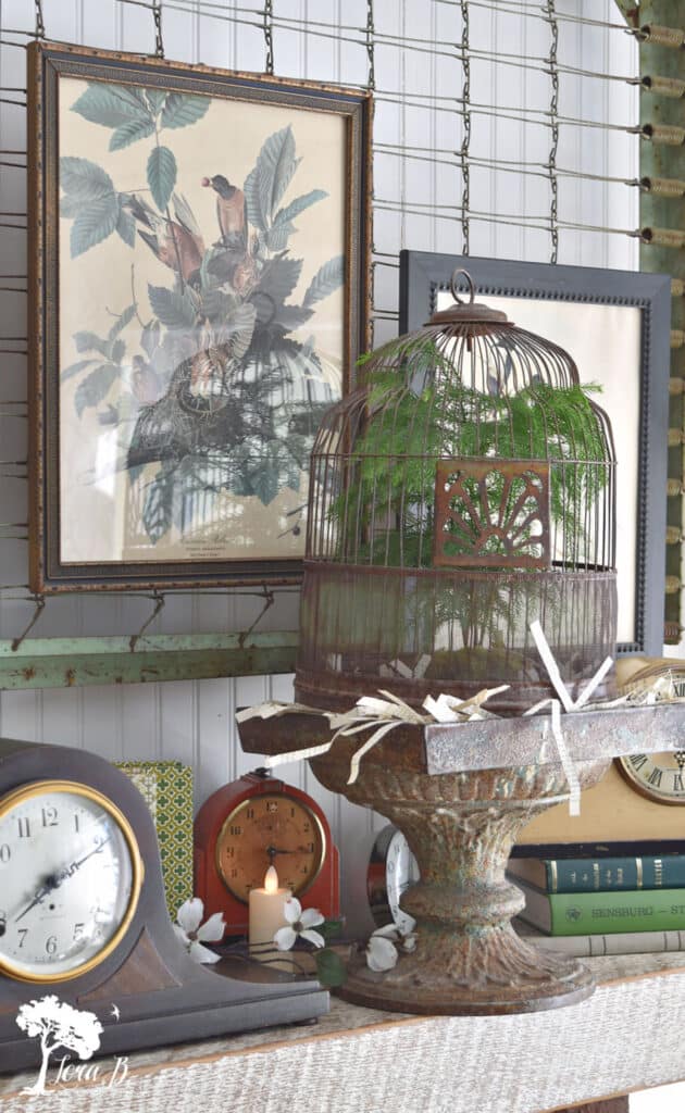 Vintage birdcage as mantle decor