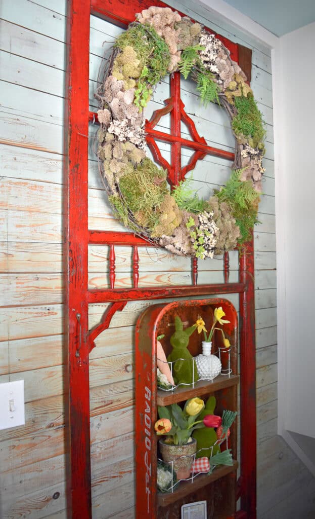 Victorian screen door and wagon shelf decorated for Spring.