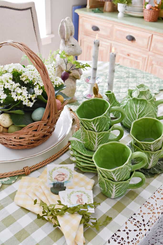 Green cabbage ware dishes on Easter table.