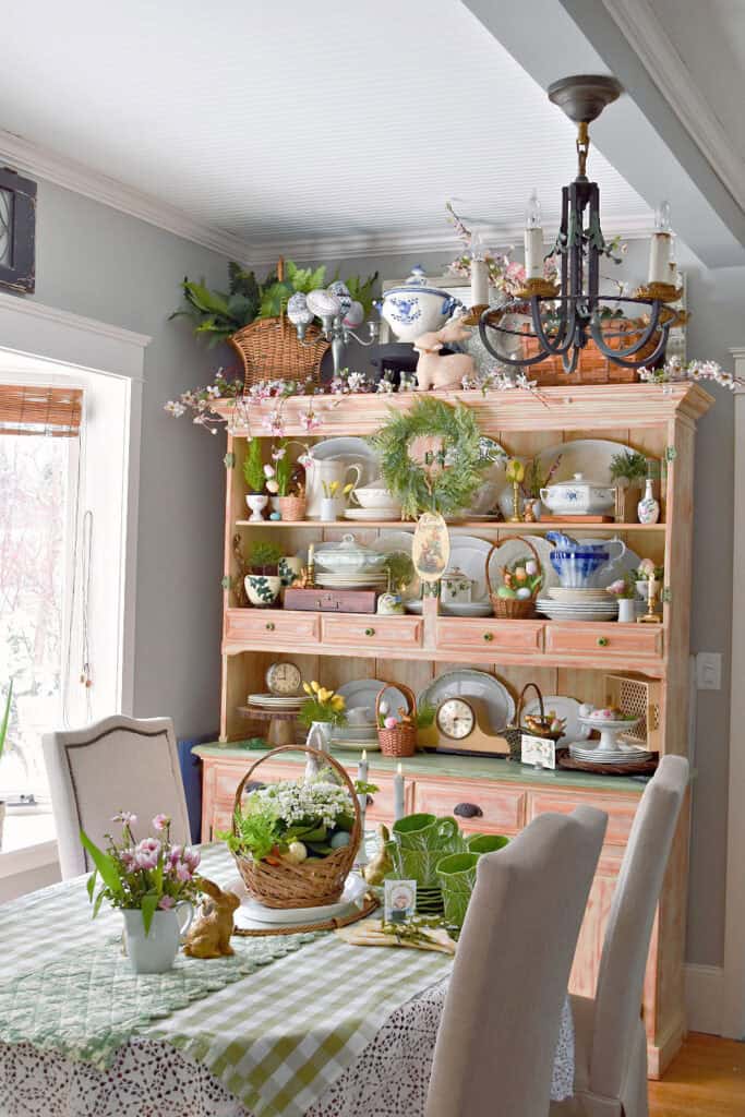 Spring decorated dining room with beautiful Spring hutch display.