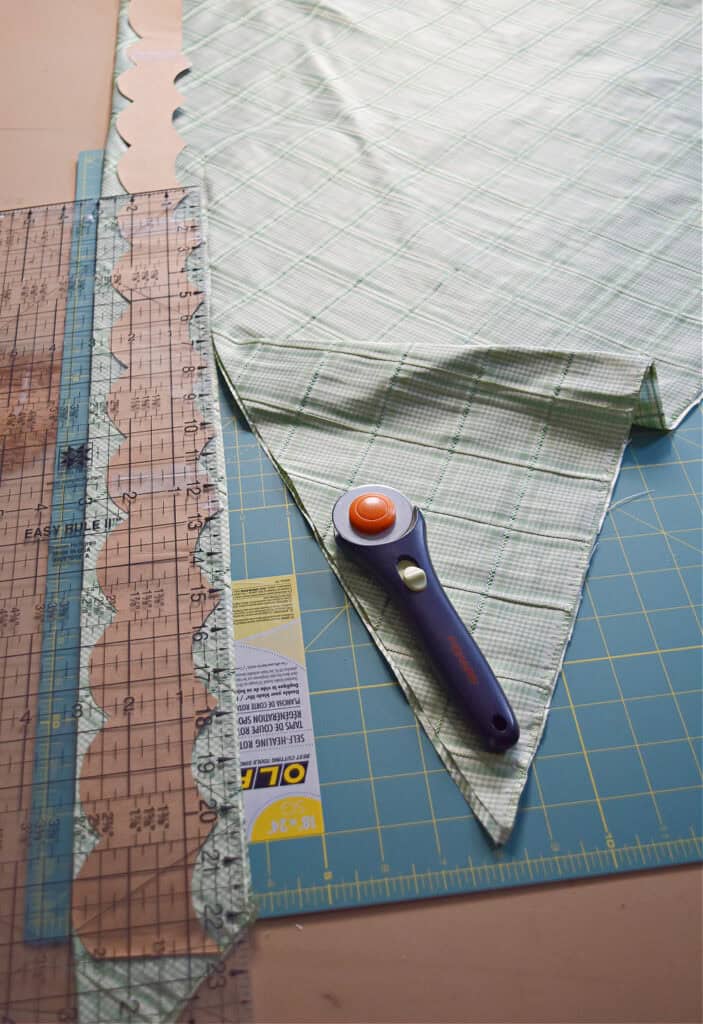 DIYing scalloped fabric trim.