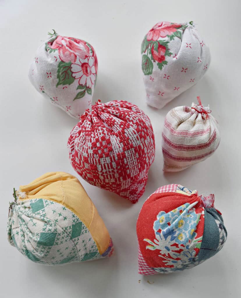 Crafting fabric strawberries.