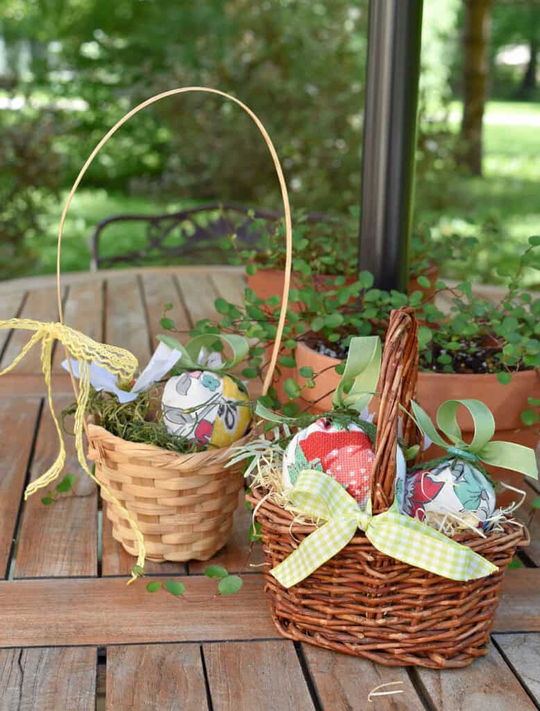 Fabric strawberries in baskets.