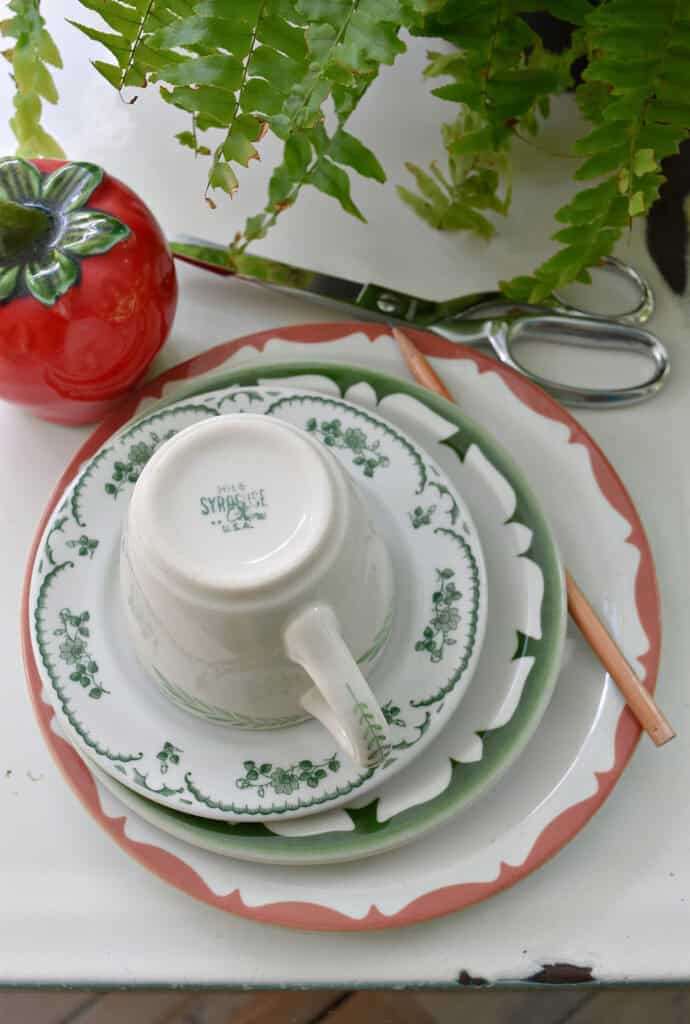 Vintage restaurant ware dishes in green and pink.