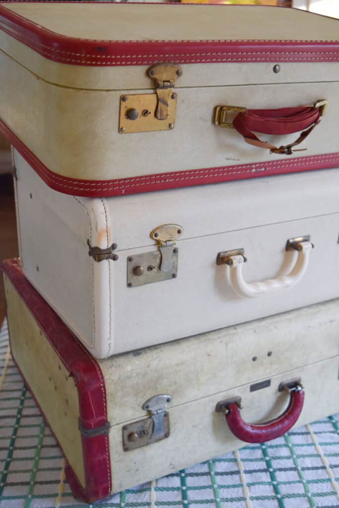 Red trimmed vintage suitcases