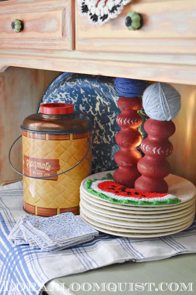 Vintage Playmate yellow picnic jug as summer hutch display.
