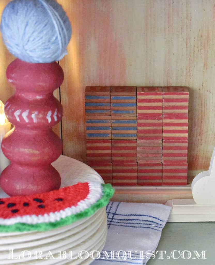 Red and blue striped old wooden blocks as American flag.