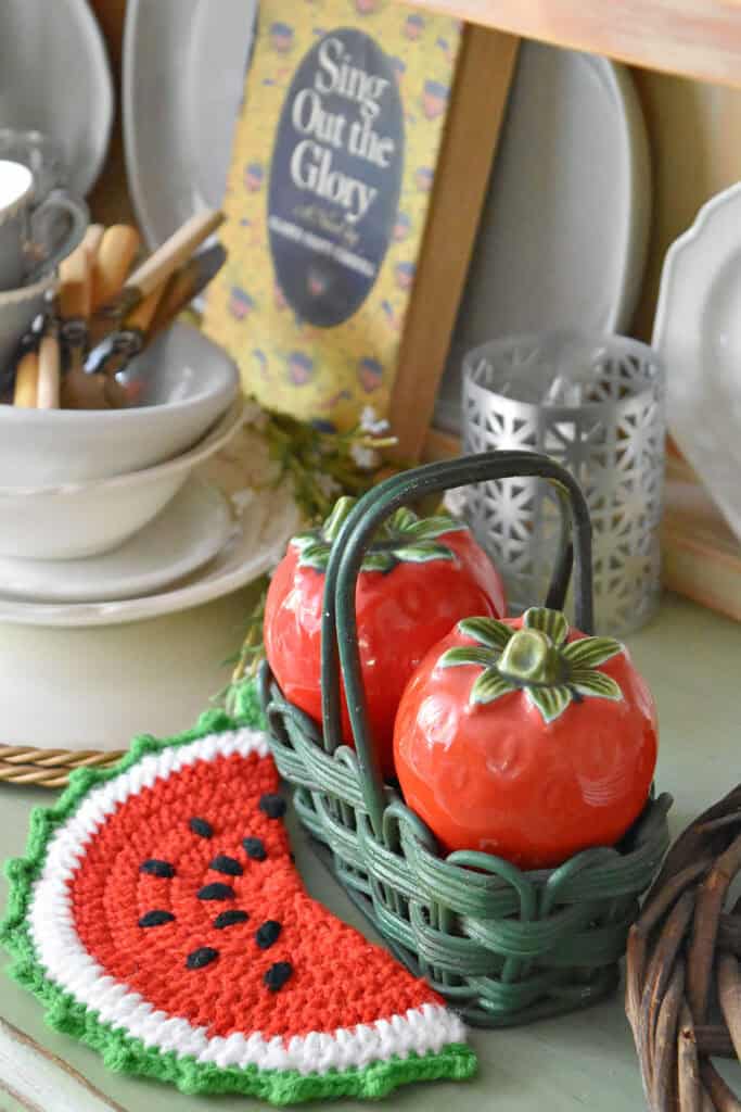 Vintage strawberry salt and pepper and watermelon hot pad.