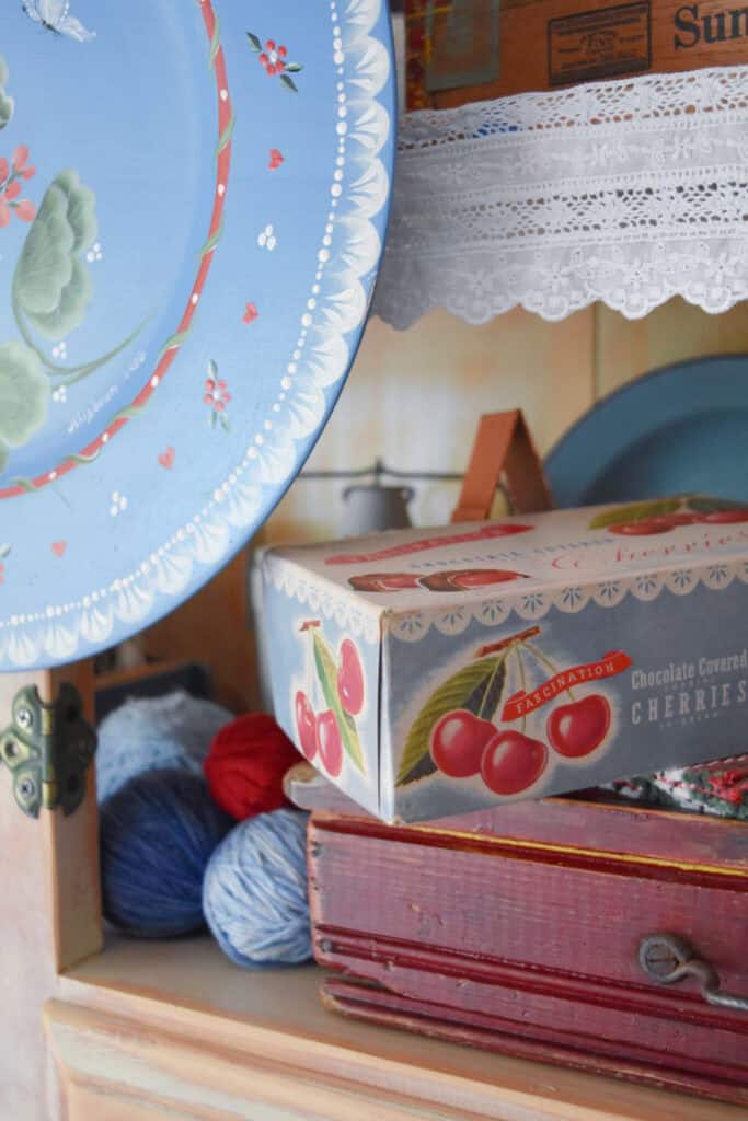Vintage cherry package with blue plate for summer decorating.