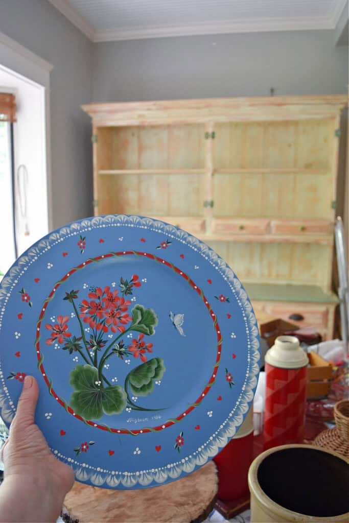 Hand painted blue plate with red flowers for summer vignette.
