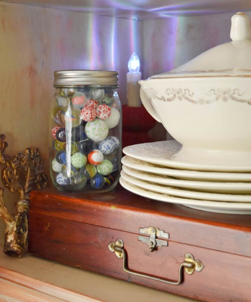 Vintage colorful marbles in canning jar.