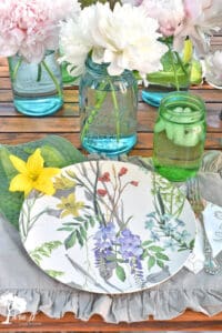 Get casual outdoor summer table setting ideas on this pretty vintage-inspired patio table.