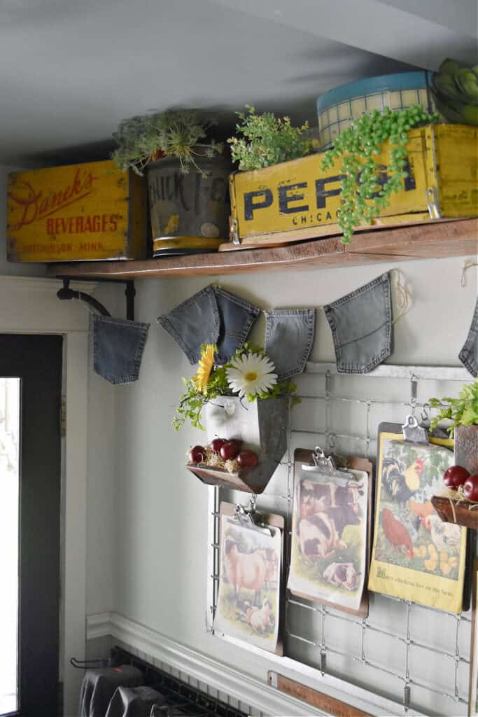 Vintage decor display with soda pop theme and denim garland.