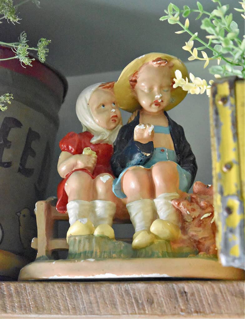 Vintage figurine with 2 girls and dog.
