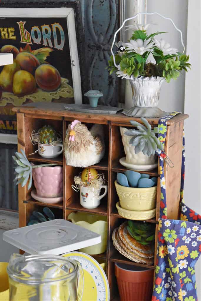 Vintage ceramic planters and farmhouse kitchen decor display.