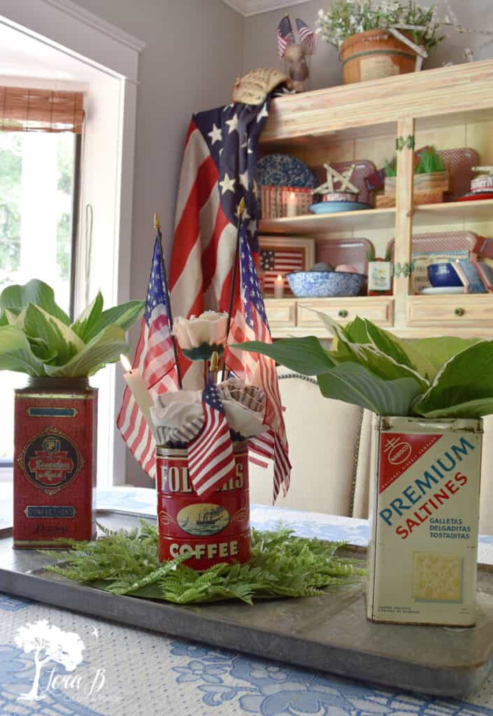 Patriotic centerpiece with old food tins
