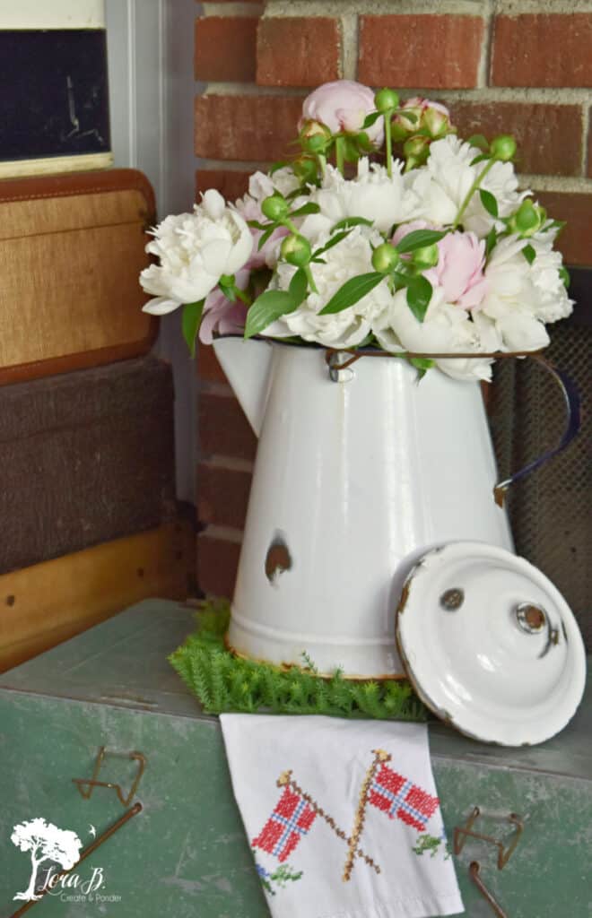 Vintage enamelware coffeepot with peonies