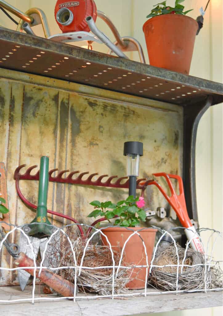 Vintage garden tool display.