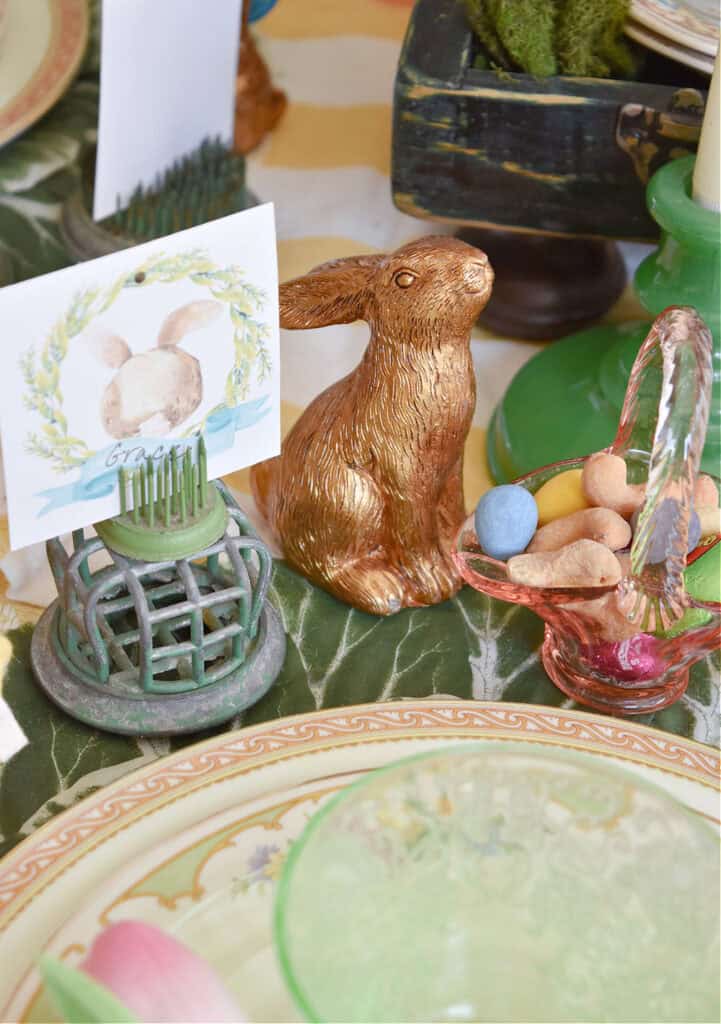 Gold bunny at place setting.