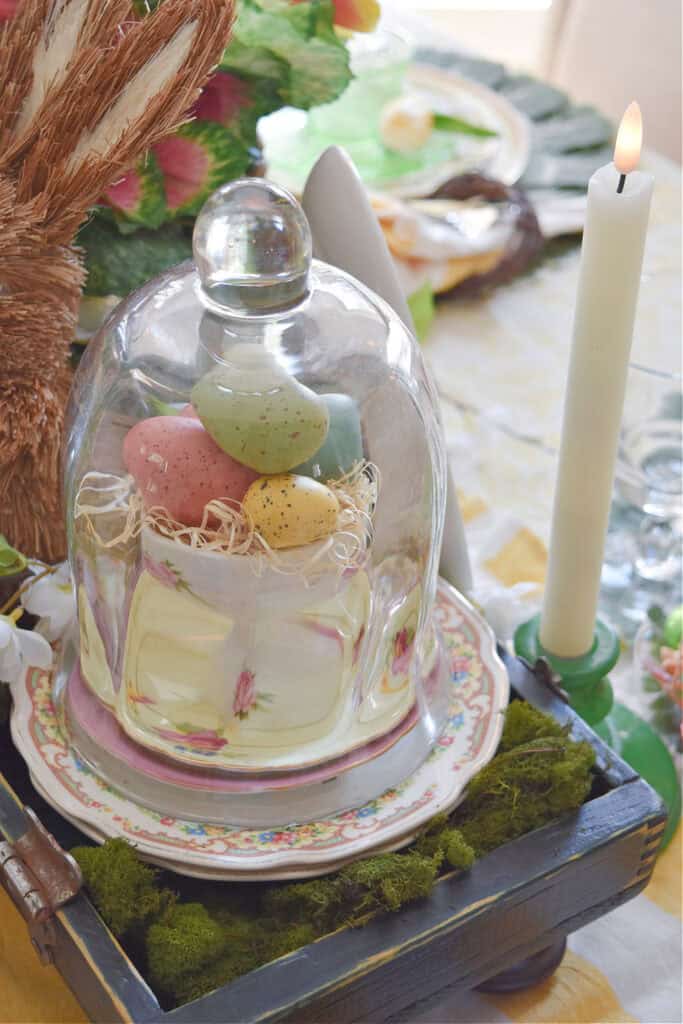 Glass cloche with eggs for Easter