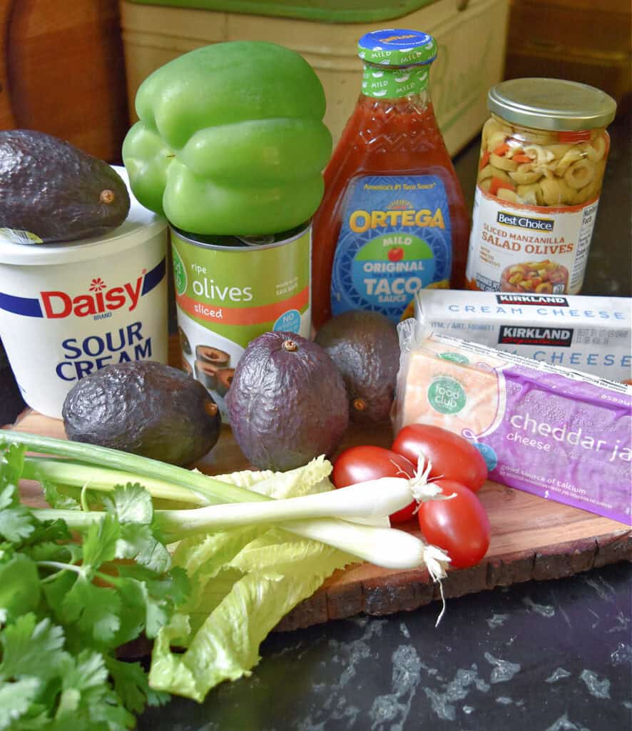Ingredients to make layered taco dip
