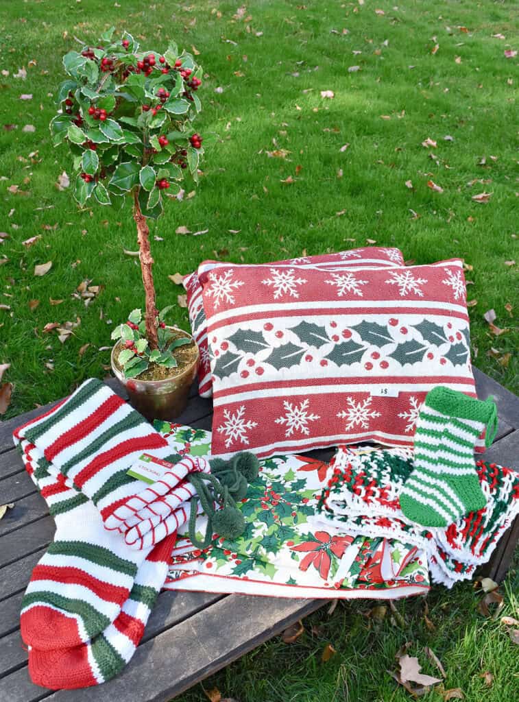 Thrifted Christmas items on table.