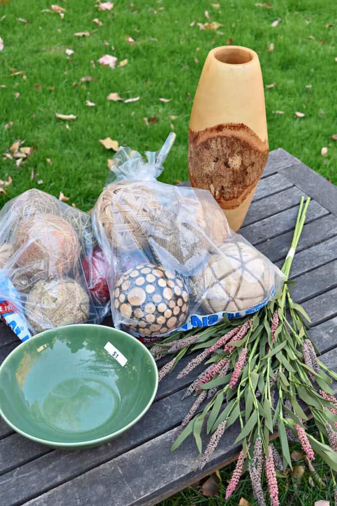 Rustic decor spheres in bag and thrifted finds.