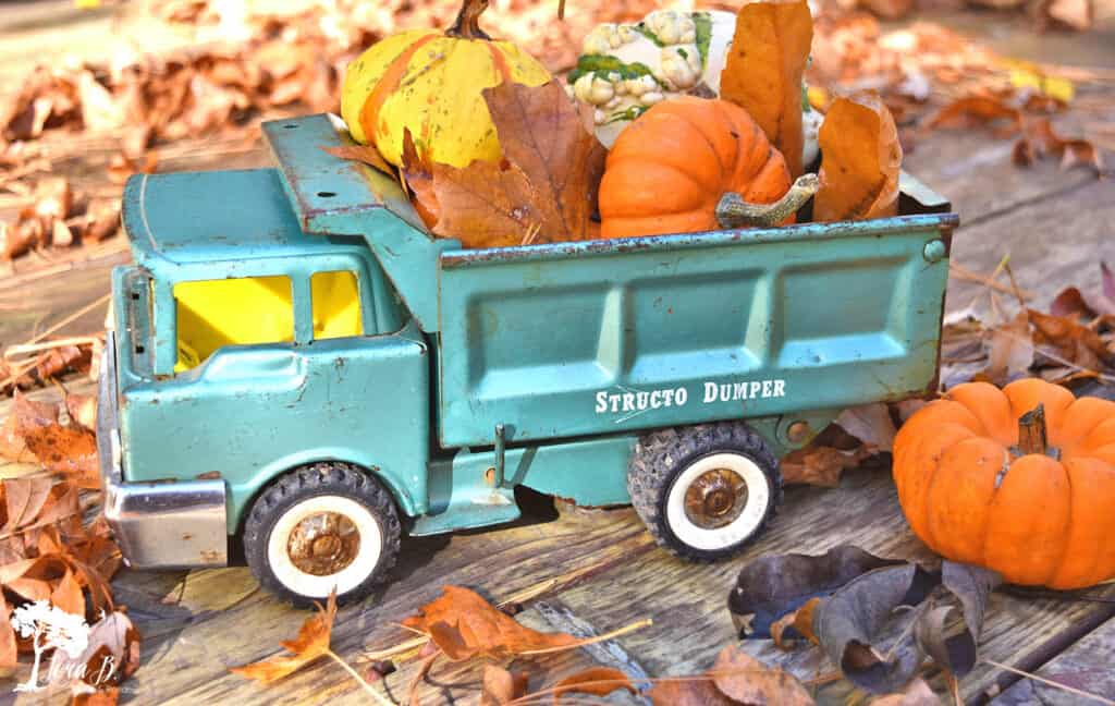 Vintage toy truck with pumpkins