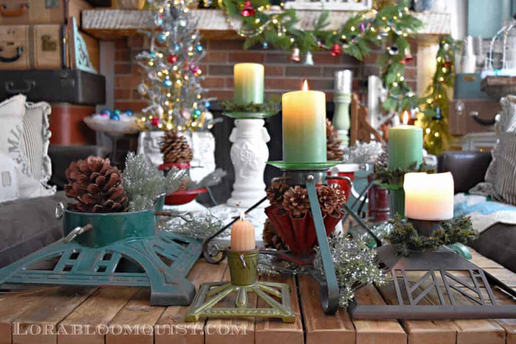 Table full of vintage Christmas tree stands