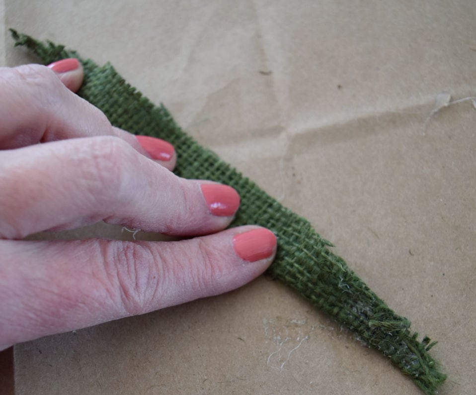 Folding green burlap leaf.